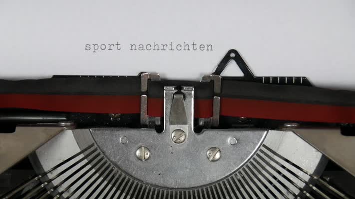 523_Sport_Nachrichten_drehen_Schreibmaschine